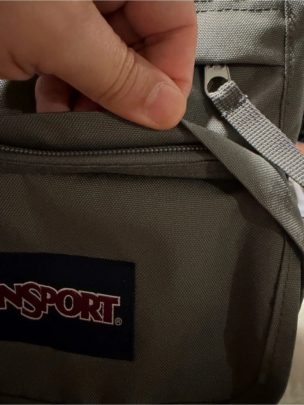 Jansport Gray Backpack with Front Pocket and Logo Patch
